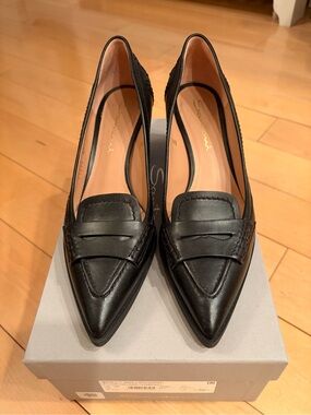 Santoni women’s black leather mid heeled loafer.  Size 39/9
